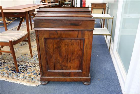 A late Victorian walnut davenport W.56cm